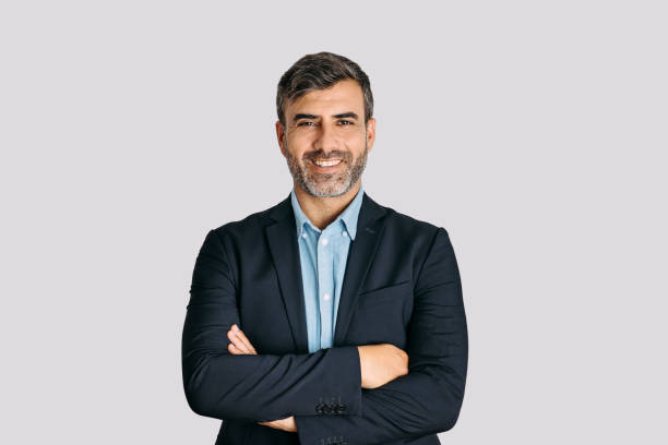 Front view of businessman smiling with arms crossed on white background Front view of businessman smiling with arms crossed on white background
